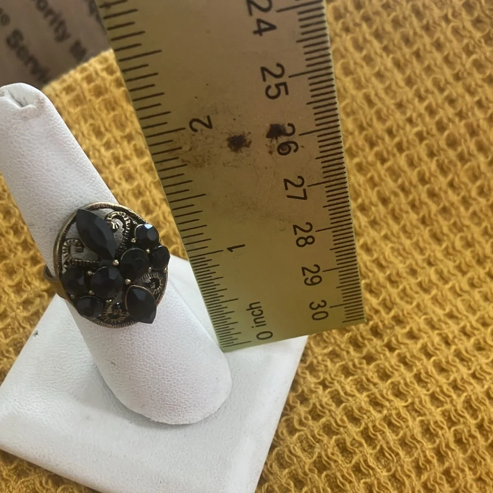 Elegant Black and Gold tone adjustable Ring